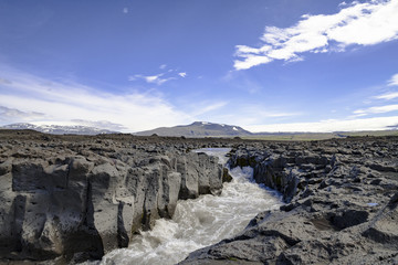 River Geita running through a basalt field in Iceland
