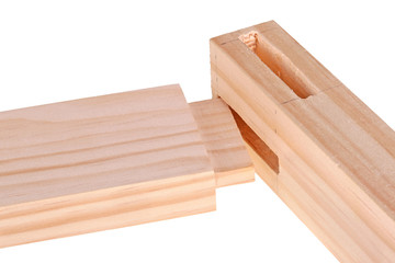 Close-up of boards with woodworking tenon inserted into a mortis