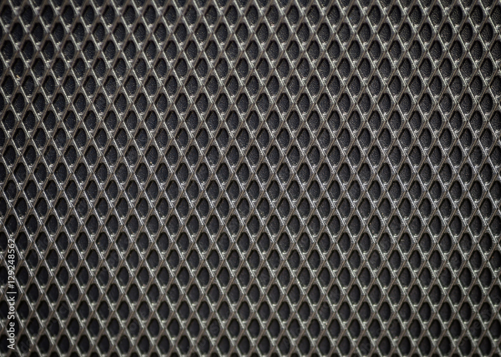 Wall mural plastic grille. grid of audio amplifier background.