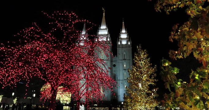 Salt Lake City Temple night Christmas lights trees. The Church of Jesus Christ of Latter-day Saints, LDS or Mormon Church. Christmas holiday season, colorful lights. Headquarters.