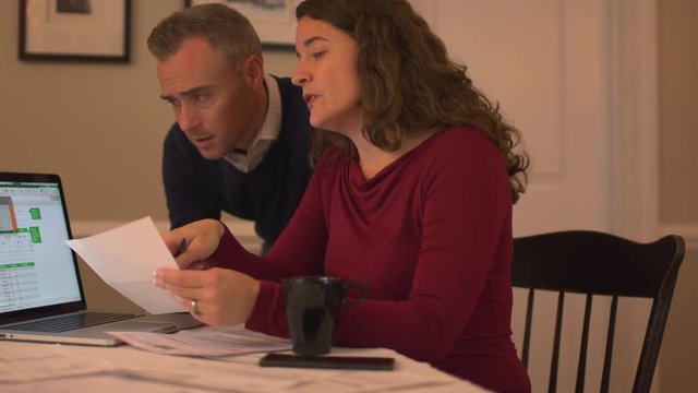 a couple crushed by their debt