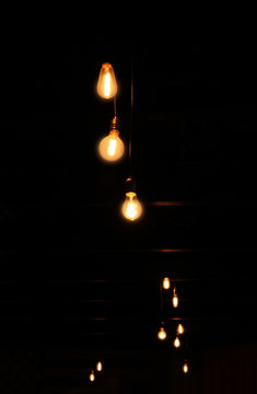 Decorative lighting. Bright lamps in the dark