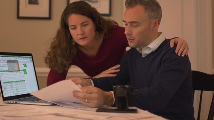 a couple is heartbroken over their debt