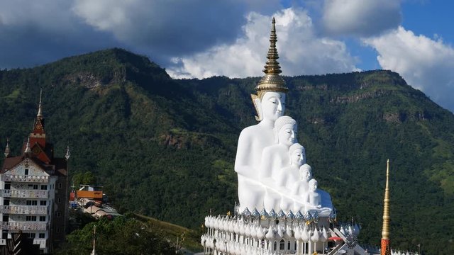 panning shot of Five Buddhas at Wat Phra Thad Pha Son Kaew Temple, Phetchabun, Thailand