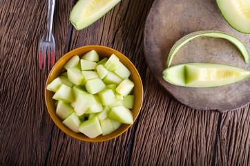 Melon in a blow top view background.