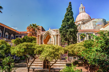 Cloister of the Benedictine Monastery of San Nicolo l'Arena in Catania, Sicily, Italy, - a jewel of the late Sicilian Baroque style. - obrazy, fototapety, plakaty