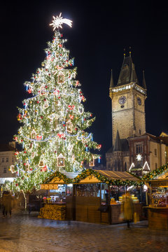 Old Town Square with the Christmas tree in Prague at Christmas time.