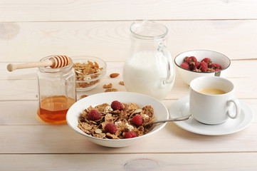 cereal with raspberries and almonds, milk, honey and coffee heal
