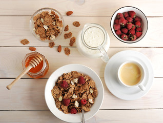 cereal with raspberries and almonds, milk, honey and coffee heal