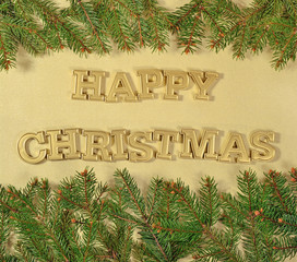 Happy christmas golden text and spruce branch