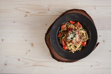 Italian bolognese with meatballs,tomato sauce and parmesan chees