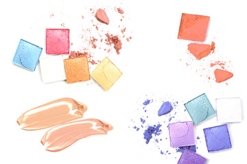 collection of various make up accessories on white background