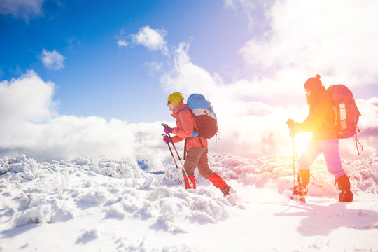 Climbers are on snow.