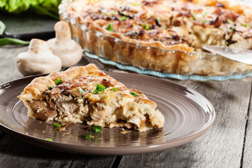 Slice of tart with chicken amd mushrooms