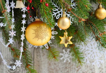 Christmas decorations of bauble on the branches of spruce