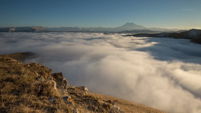 Russia, timelapse. The formation and movements of clouds up to the steep slopes of the  mountains of Central Caucasus peaks.
