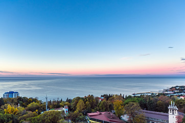 Autumn dawn on the coast in Sochi
