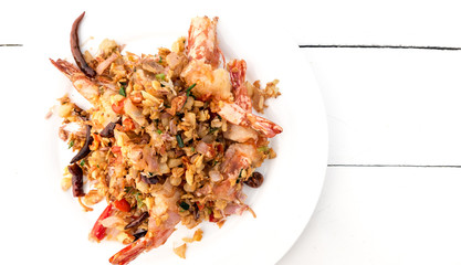Top view of Fried shrimp with salt and pepper on white wooded background