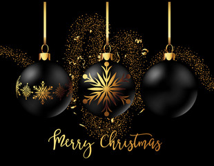 Black Christmas decoration ball with golden ribbon bow on black background.