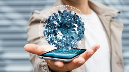 Businessman holding flying abstract sphere over mobile phone 3D