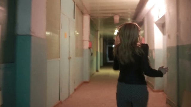 girl runs away from pursuing the stairs