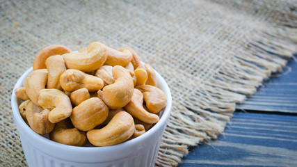 cashew nuts salted and roasted isolated on white background (cen