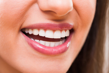 Close up image of perfect female teeth.