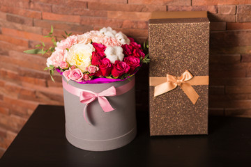 Flowers and a gift box