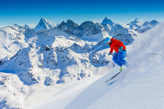 Skiing with amazing view of swiss famous mountains in beautiful.