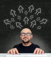 Arrows going out of the head of a young attractive bold man geek