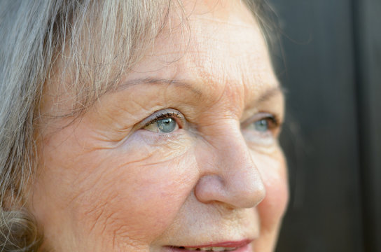 Close up of the blue eyes of an elderly lady