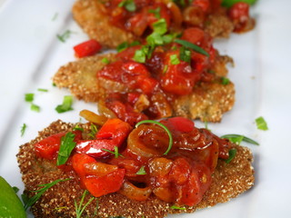 fried fish herring with tomato sauce