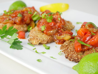fried fish herring with tomato sauce