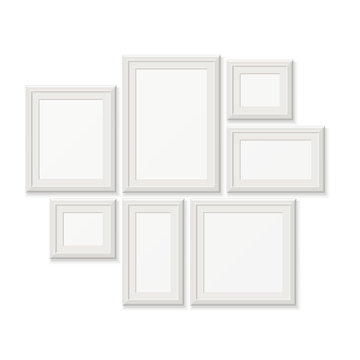 Empty white pocture frames, 3d photo borders isolated on wall