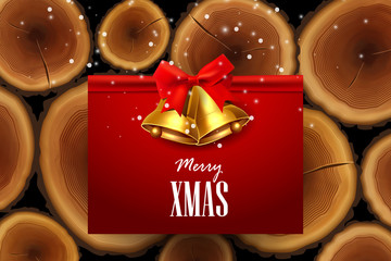 Christmas background with gold bells, red bow and tree trunk rings.