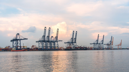 Obraz premium Containers loading by crane in the morning , Trade Port , Shipping