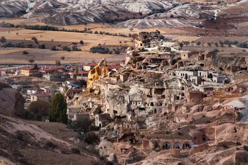 Fotobehang Ancient cave city Kavushin in Cappadocia, Turkey © tns2710