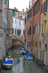 the narrow water canal in Venice