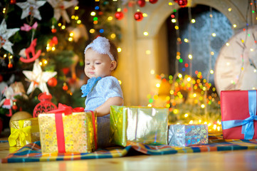 little girl with Christmas gifts