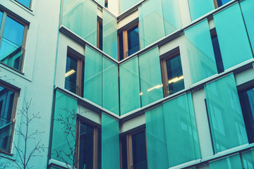 high contrasted office facade in green/blue colors
