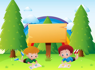 Obraz na płótnie Canvas Two boys reading books in park