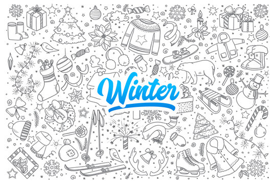 Hand drawn set of winter doodles with blue lettering in vector
