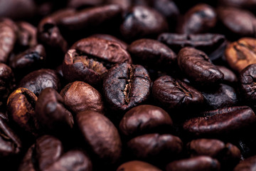 Frame of roasted coffee beans isolated on white