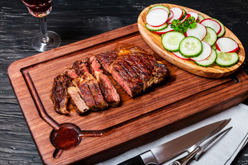 Fototapeta na wymiar sliced medium rare grilled Beef steak Ribeye