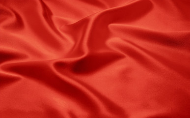 Fototapeta na wymiar red satin or silk fabric as background