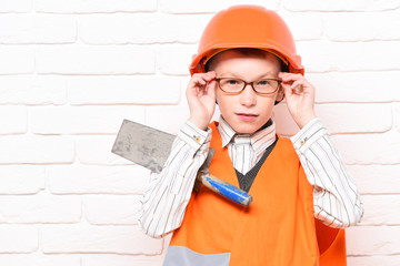 young cute builder boy