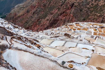 Salinas de Maras,Peru . Salt natural mine. Inca Salt pans at Maras, near Cuzco in Sacred Valley, Peru. Panoramic view.