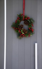 Fototapeta na wymiar christmas decoration on door