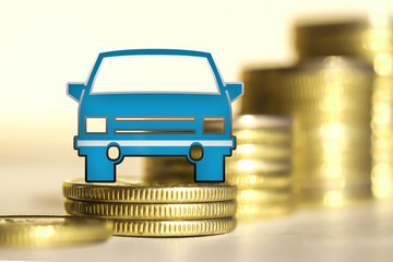 The car in the background of bars coins . The concept of change of car prices .