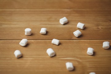 Fototapeta na wymiar Sweet marshmallow on wooden table